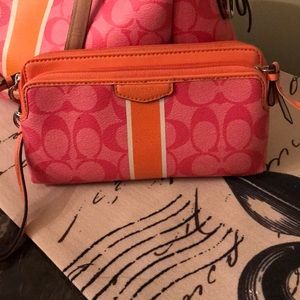 Orange and Pink coach wallet /clutch